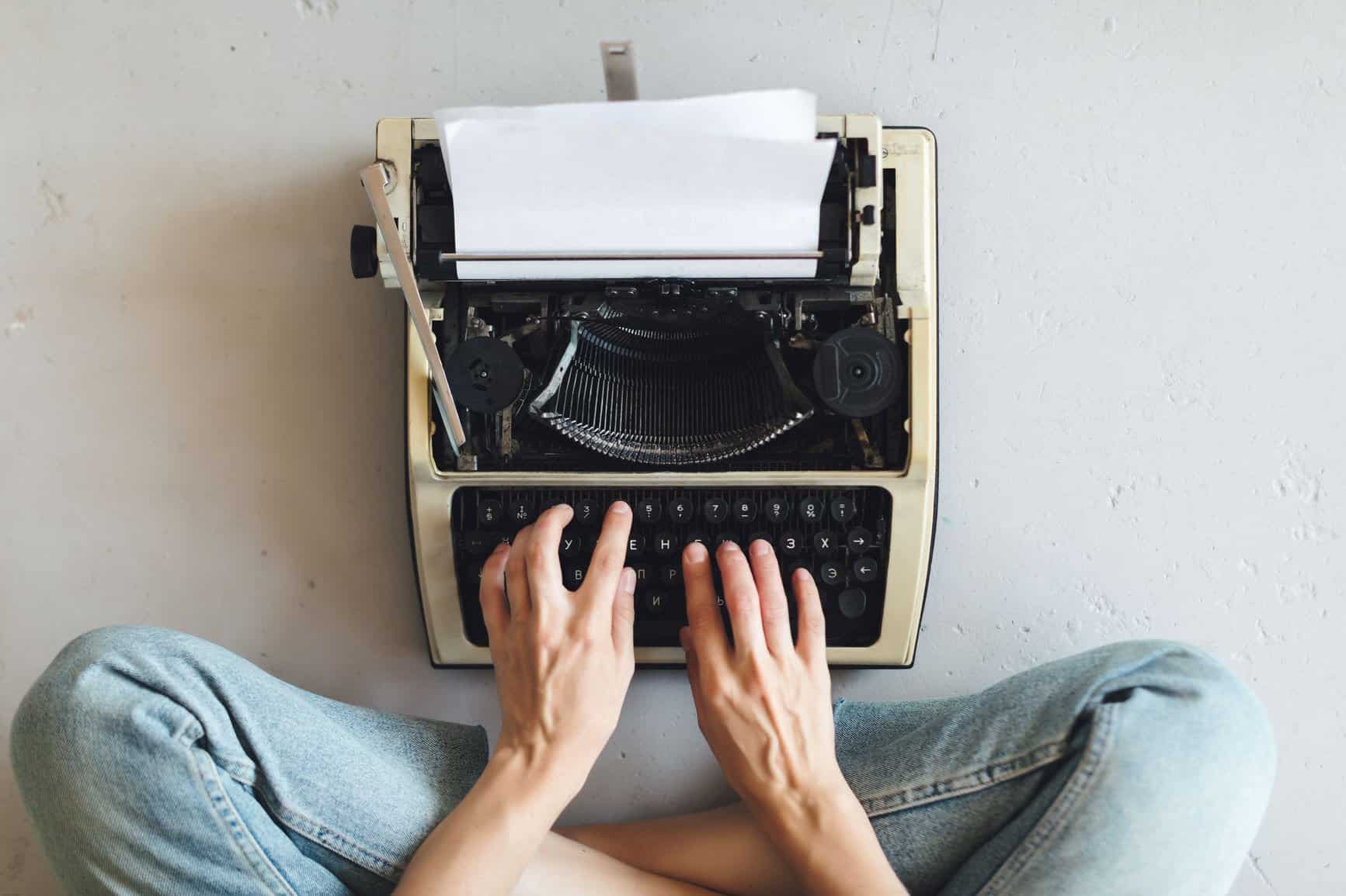 A person at a typewriter.