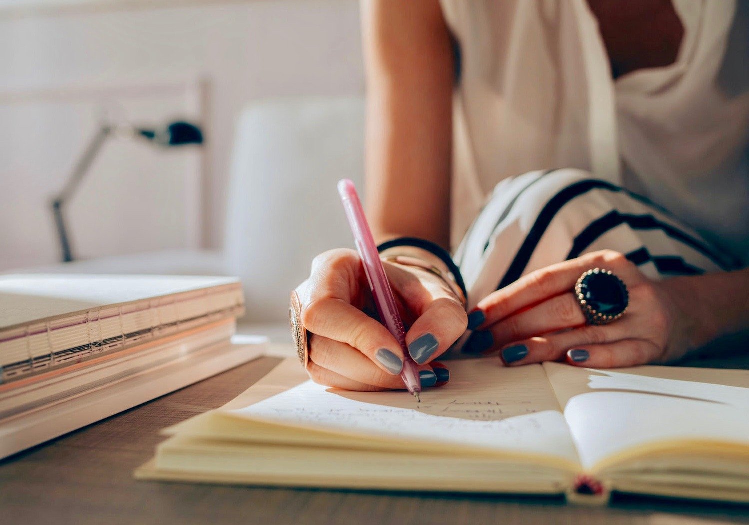 A woman journaling.