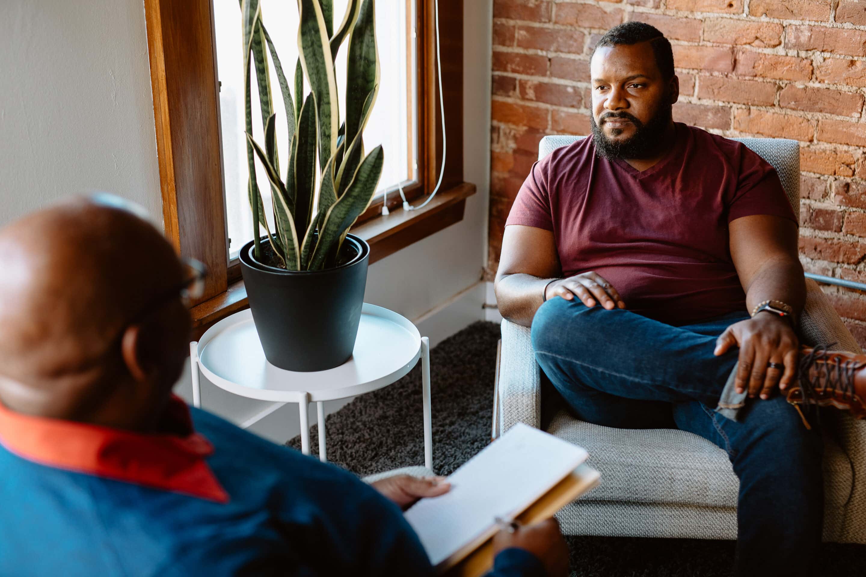 man talking to therapist