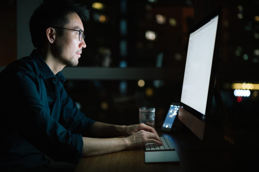 Businessman Working From Home In Night