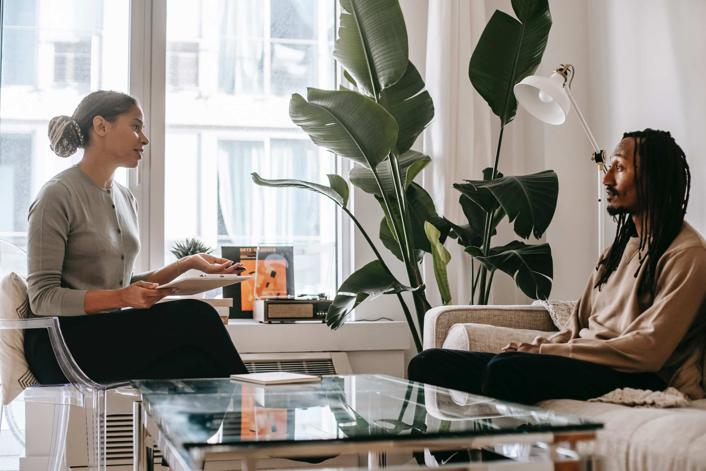 Two people in a therapy session.