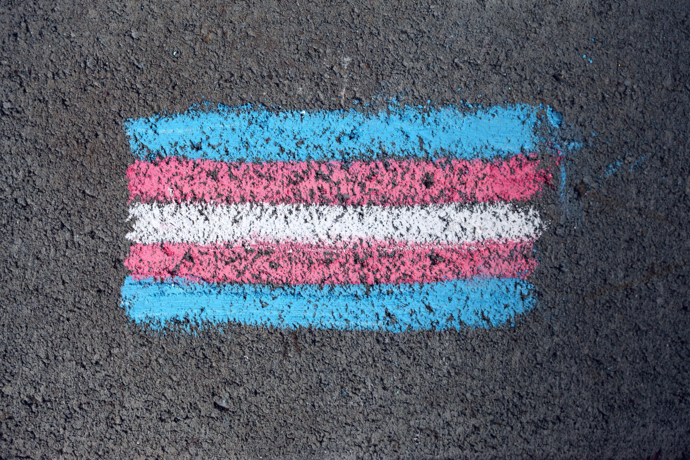 Chalk drawing of a blue, pink, and white flag.