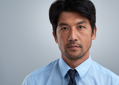 headshot of middle aged asian male