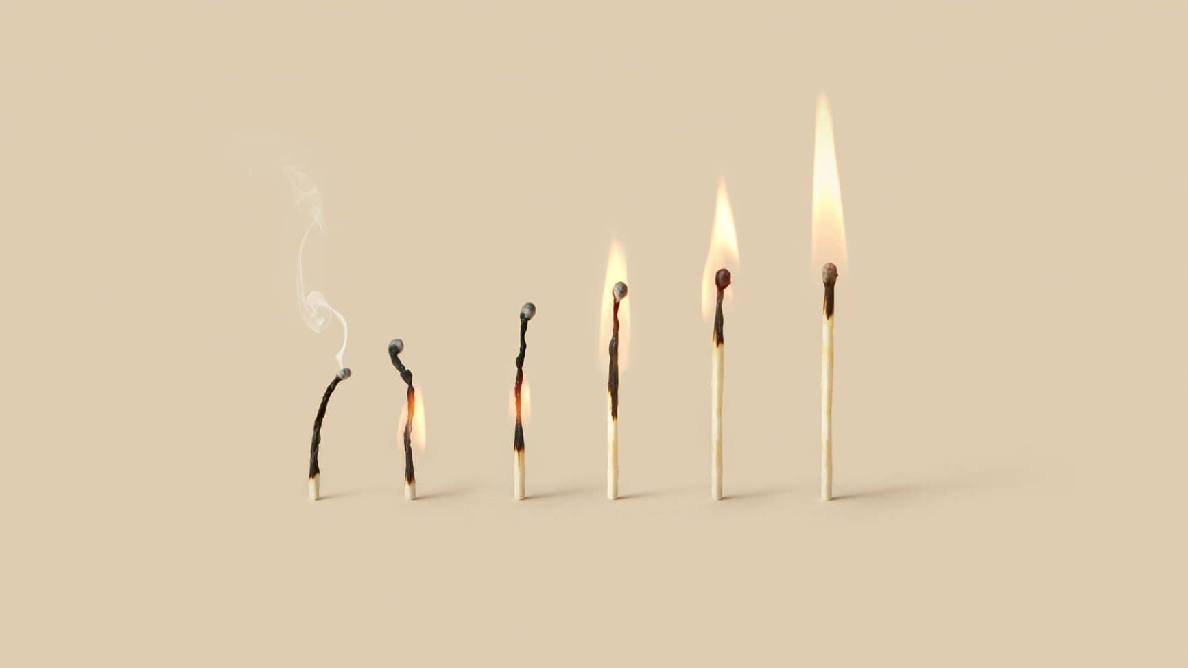 Burning wooden matches set with varying level of burnout