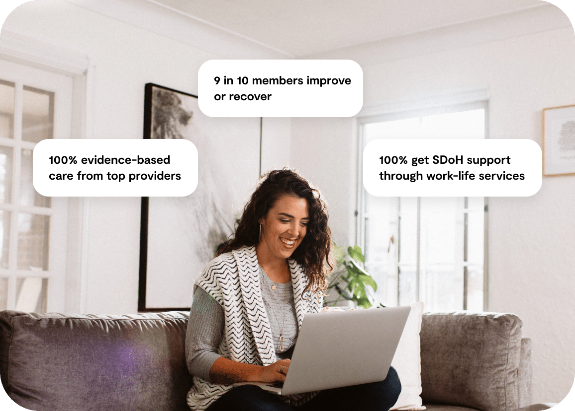 Women using a laptop on a couch