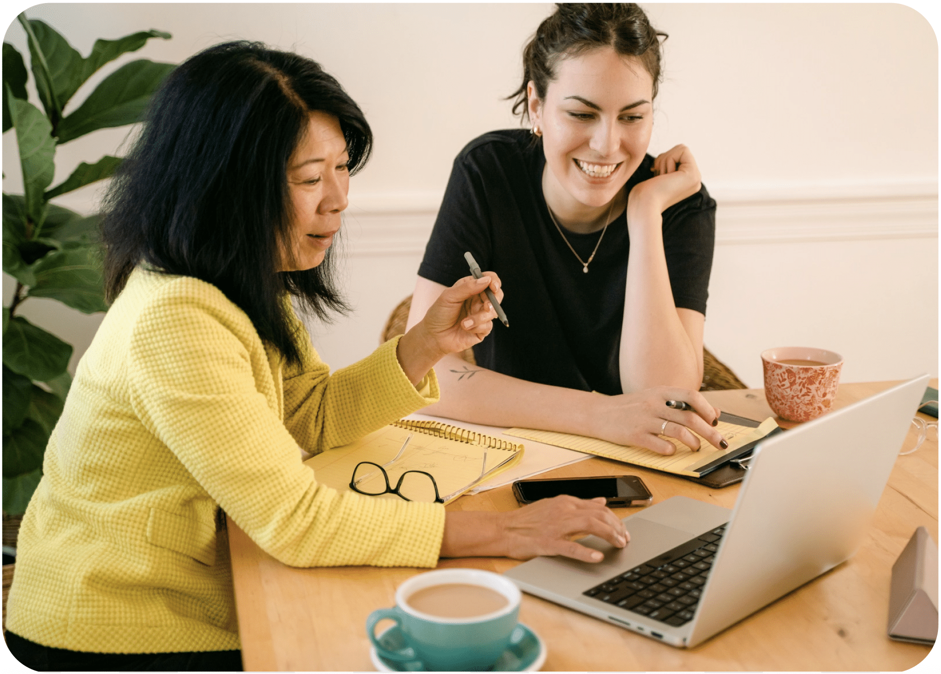 two people looking at a computer screen