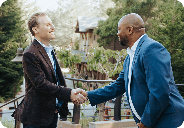 david ebersman shaking someone's hand