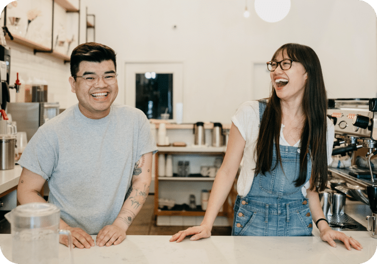 man and woman laughing