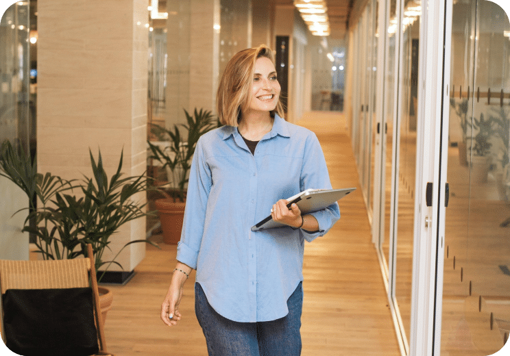woman walking down a hallway