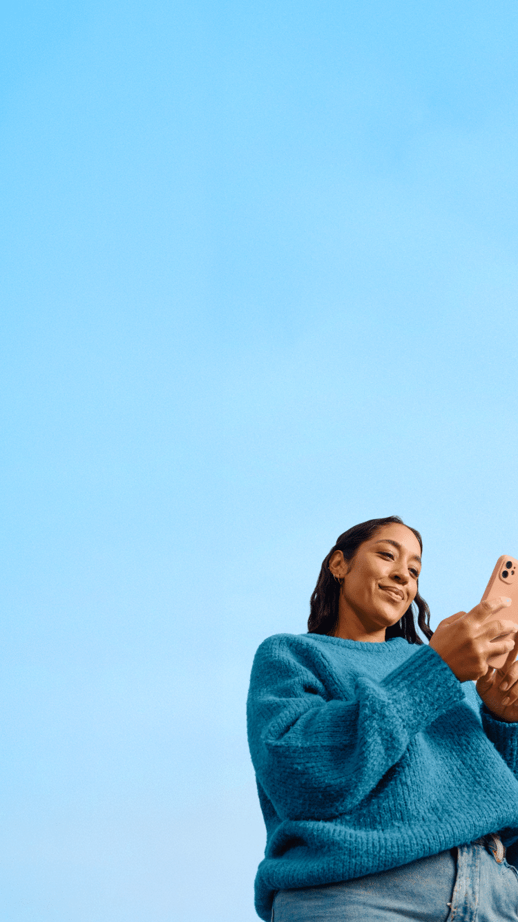 woman looking at her phone